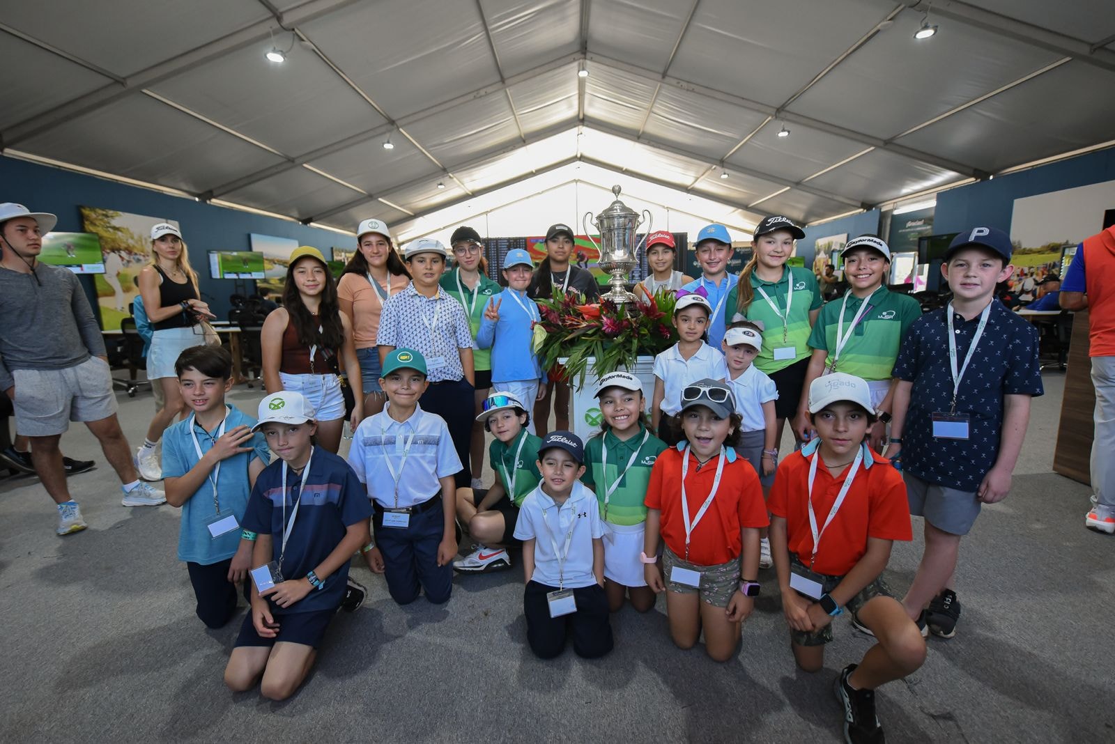 Kids golf clinic with trophy at Mexico Open
