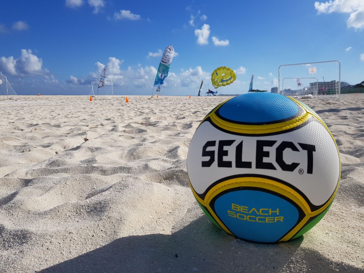 Beach soccer ball at outdoor sports event