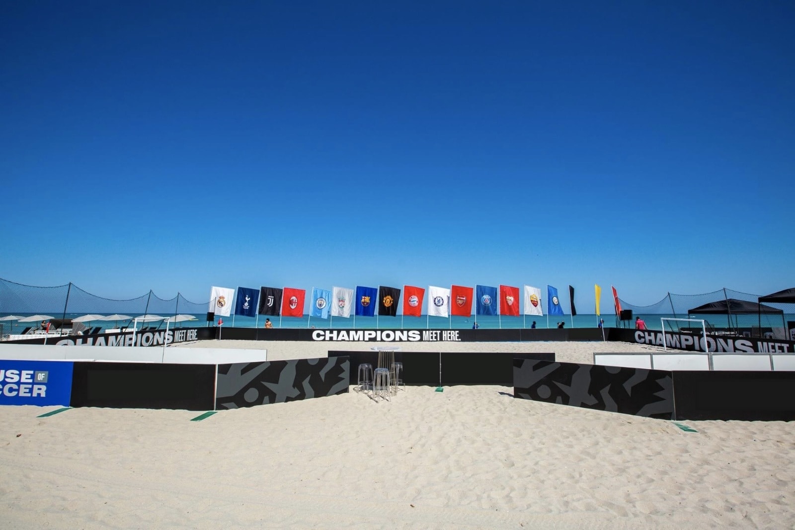 Champions Meet Here beach soccer activation with club flags